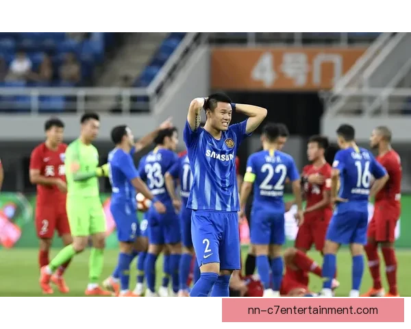 江苏苏宁夺中超后宣布解散引发足球圈震动与反思